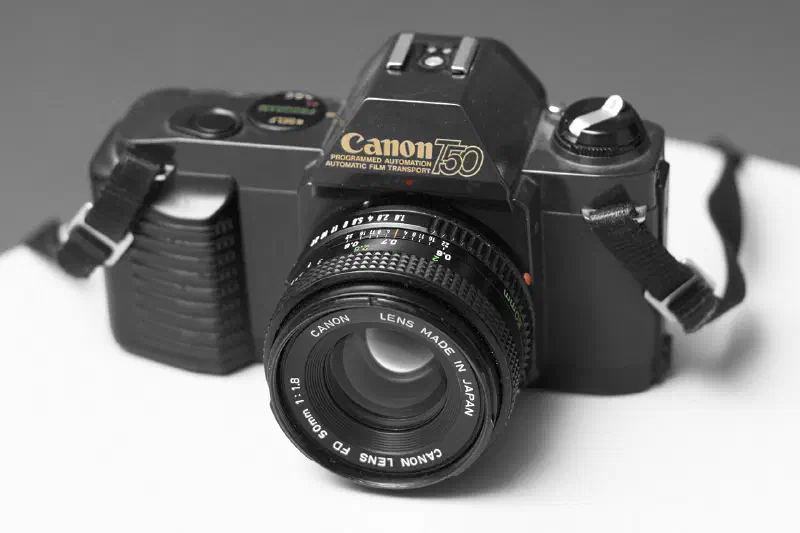 Canon T50 SLR camera with Canon FD 50 mm f/1.8 lens