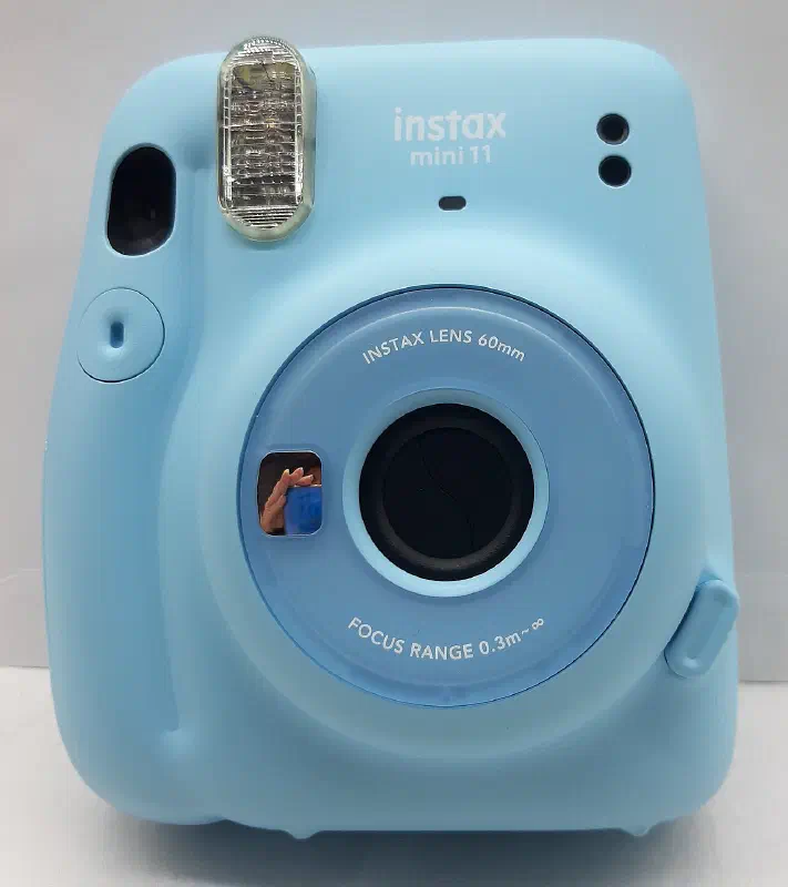 Fujifilm Instax Mini 11, photographed on its own