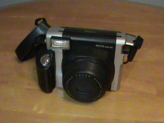 This is a Fujifilm Instax Wide 300 camera.