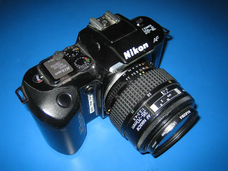 Nikon F-401 with standard lens.