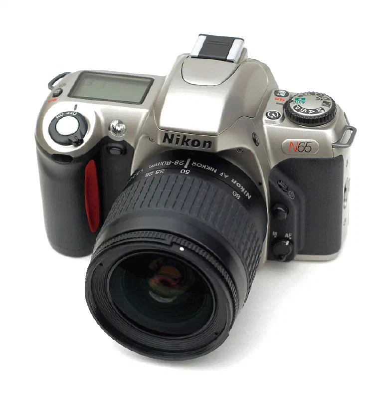Nikon N65 (sold outside the US as the Nikon F65) with its 28-80 kit lens. Introduced in the year 2001.[1]