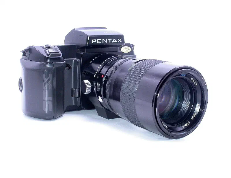 Pentax SFX camera with Vivitar macro lens.