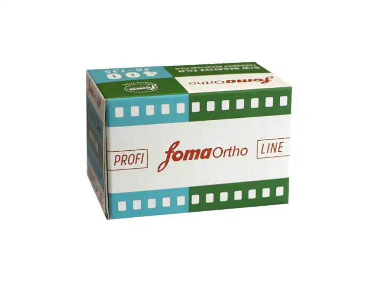 A white fomaOrtho LINE carton seen from a front corner, banded in teal and green sprocket-hole graphics and marked PROFI and 400