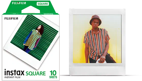 A green and white instax SQUARE INSTANT FILM carton marked 10 SHEETS, a developed square print of a man in a striped shirt standing beside it