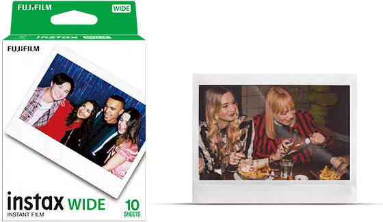 A green and white instax WIDE INSTANT FILM carton marked 10 SHEETS, a developed wide print of four people at a table standing beside it
