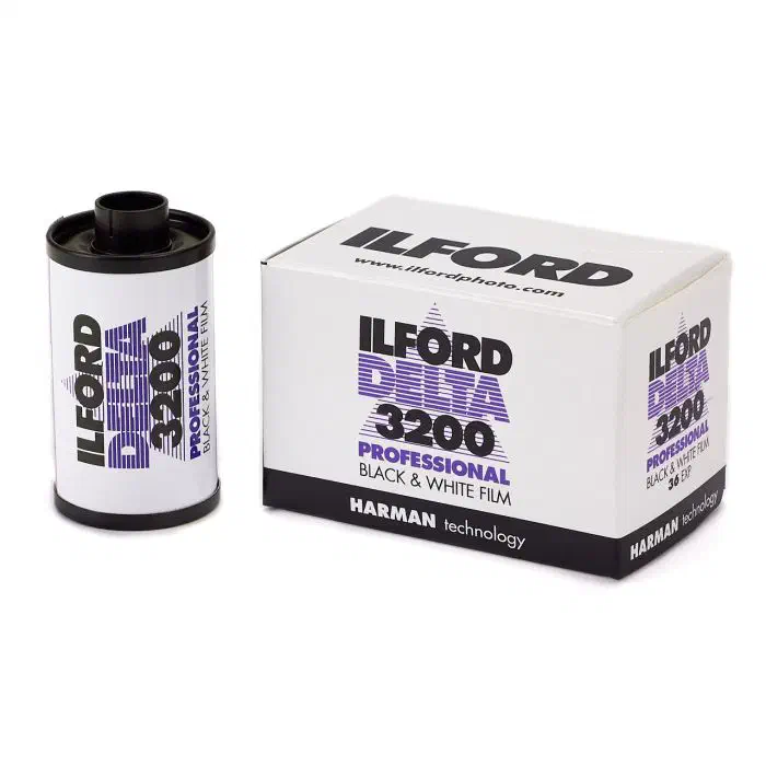 A 35 mm cassette of ILFORD DELTA 3200 Professional beside its 36-exposure carton, lettered in purple