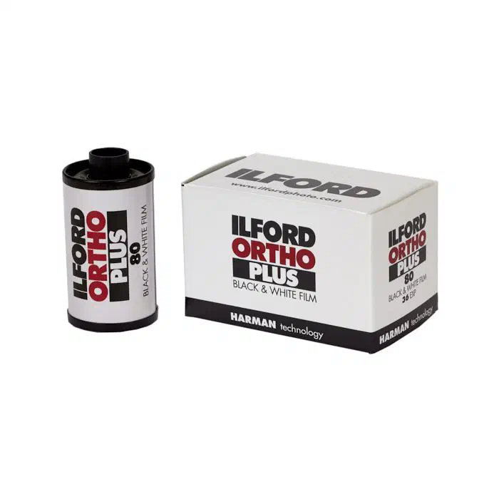 A 35 mm cassette of ILFORD ORTHO PLUS 80 beside its 36-exposure carton, lettered in red and black