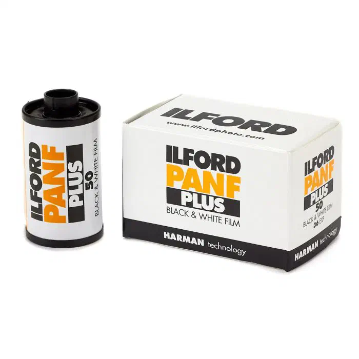 A 35 mm cassette of ILFORD PANF PLUS 50 beside its 36-exposure carton, lettered in orange