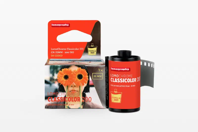 A red LomoChrome Classicolor 200 carton beside its 35 mm cassette and leader, marked CN 35MM · 200 ISO · DX CODED and FORMULA 2025