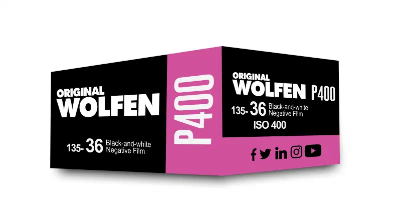 A magenta and black ORIGINAL WOLFEN P400 carton seen from a front corner, marked 135-36, ISO 400, Black and white Negative Film
