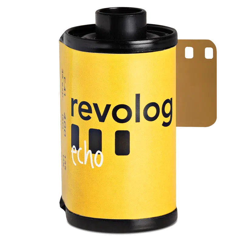 A 35 mm cassette of REVOLOG ECHO, its yellow label carrying the revolog wordmark