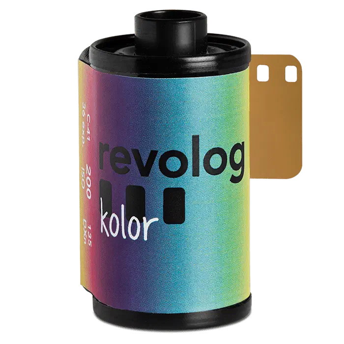 A 35 mm cassette of REVOLOG KOLOR, its rainbow-gradient label carrying the revolog wordmark