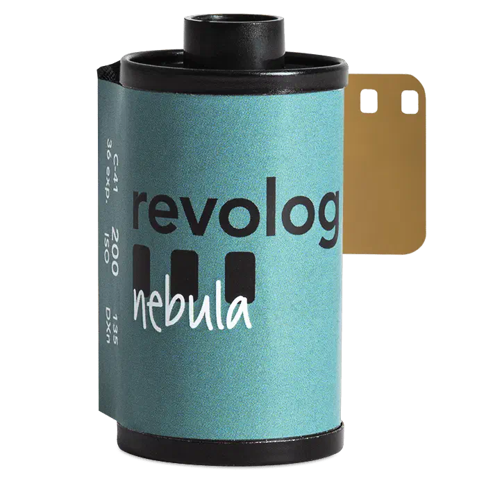 A 35 mm cassette of REVOLOG NEBULA, its teal label carrying the revolog wordmark