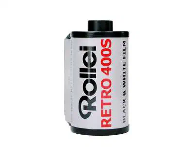A 35 mm cassette of Rollei RETRO 400S, white label lettered in red and black, marked BLACK & WHITE FILM