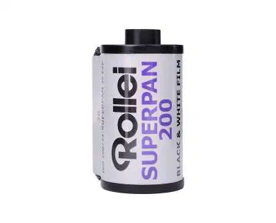 A 35 mm cassette of Rollei SUPERPAN 200, white label lettered in violet and black, marked BLACK & WHITE FILM