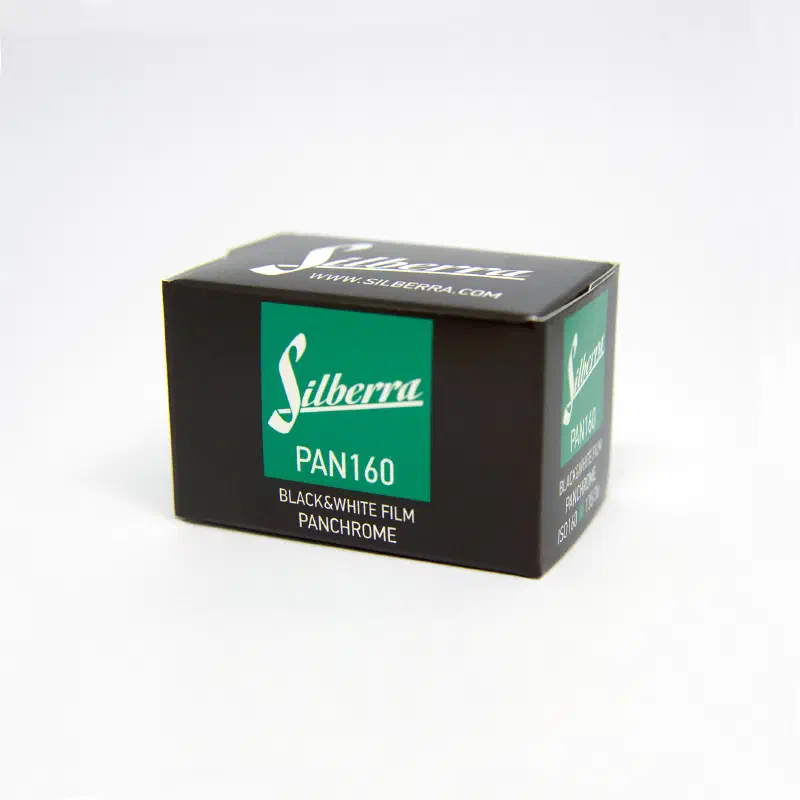 A black carton of Silberra Pan 160 panchromatic black-and-white film with a teal panel