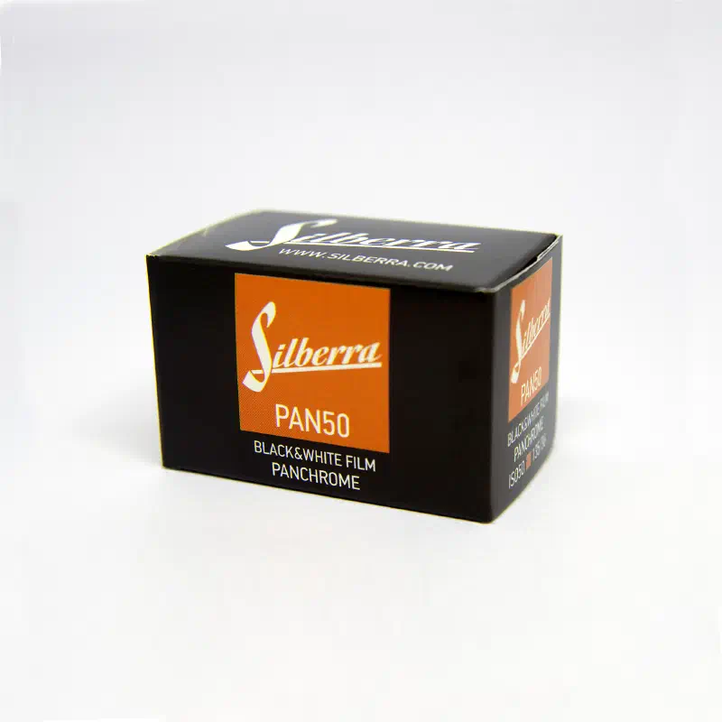 A black carton of Silberra Pan 50 panchromatic black-and-white film with an orange panel