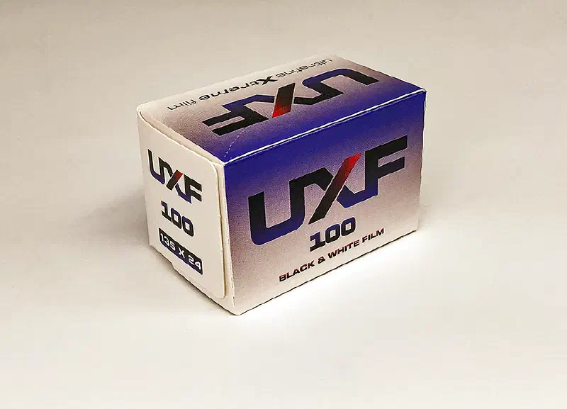 A blue and white box of Ultrafine UXF Xtreme 100 black and white film, 135 x 24