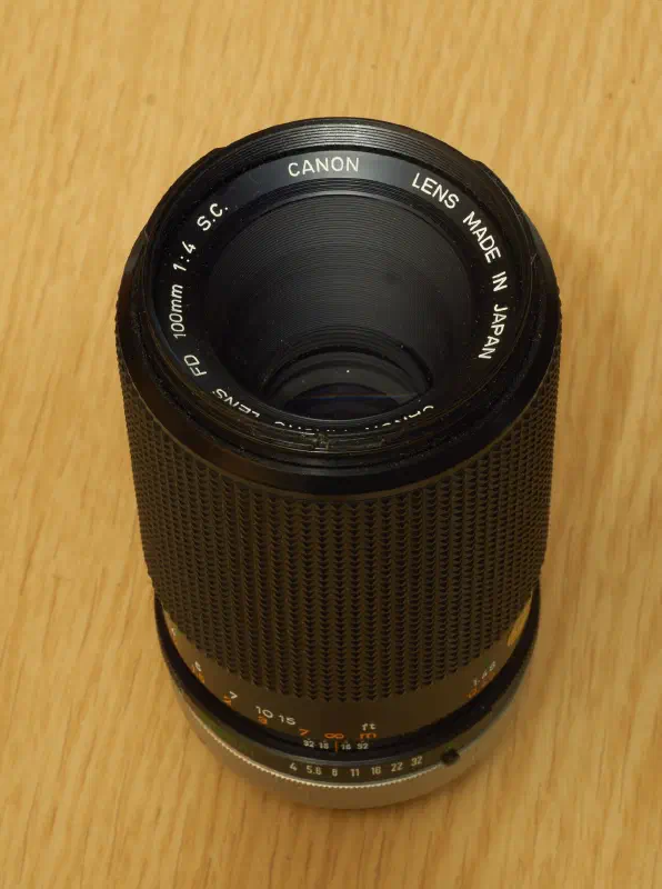 Canon New Macro FD 100mm f/4, photographed on its own, off the camera