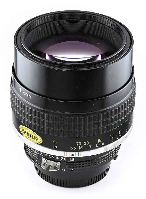 Nikon Nikkor 105mm f/1.8, photographed on its own, off the camera