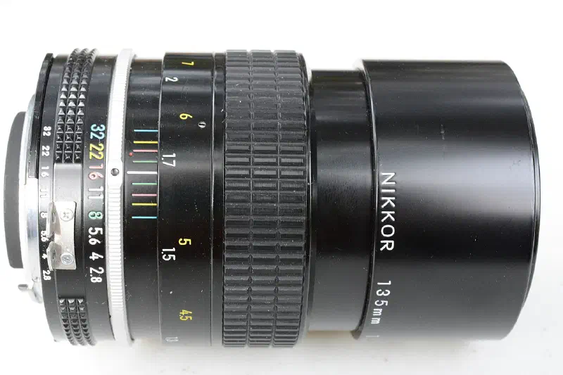 Nikon Nikkor 135mm f/2.8, photographed on its own, off the camera
