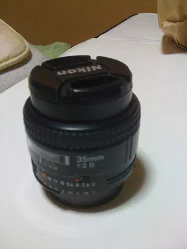 Nikon Nikkor 35mm f/2.0, photographed on its own, off the camera
