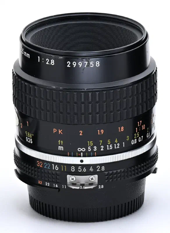 Nikon Nikkor 55mm f/2.8, photographed on its own, off the camera