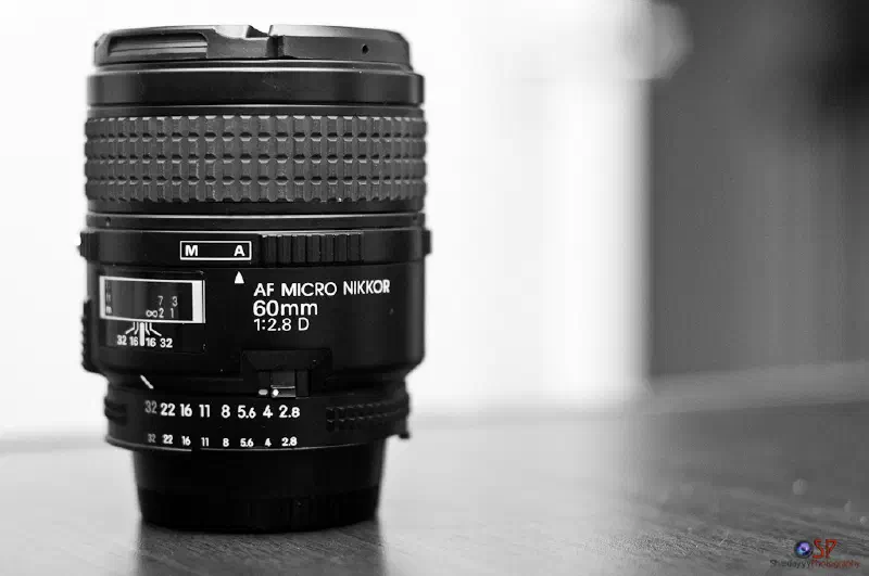 Nikon Nikkor 60mm f/2.8D AF Micro, photographed on its own, off the camera