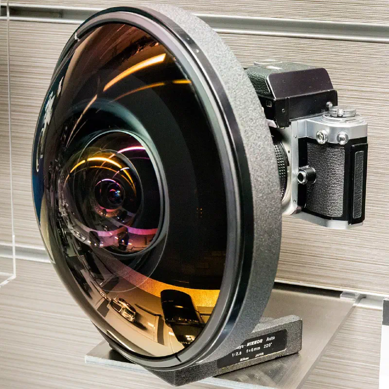 Nikon Nikkor 6mm f/2.8, photographed on its own, off the camera