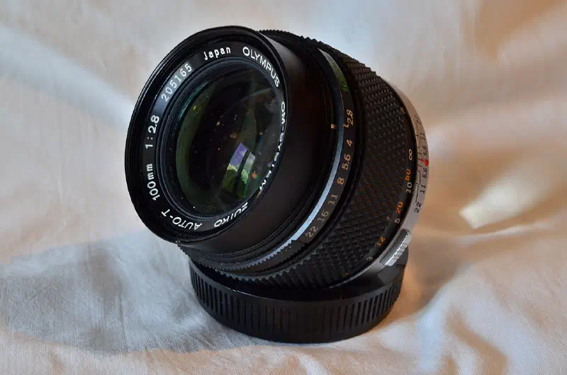 Olympus Zuiko 100mm F2.8, photographed on its own, off the camera