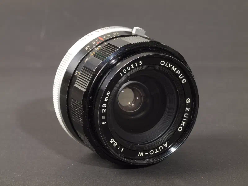 Olympus Zuiko 28mm F3.5, photographed on its own, off the camera
