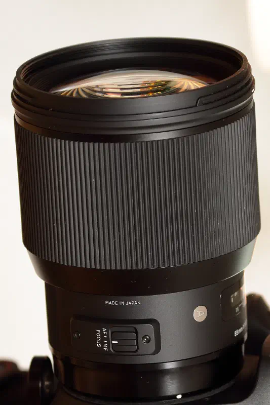 Sigma 85mm f/1.4 EX DG HSM, photographed on its own, off the camera
